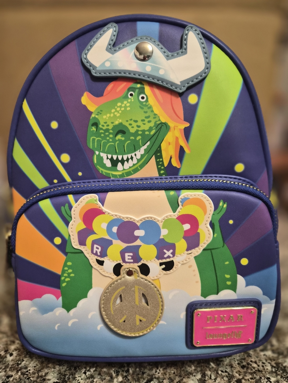 Rex Loungefly Mini Backpack in Purple and Green.